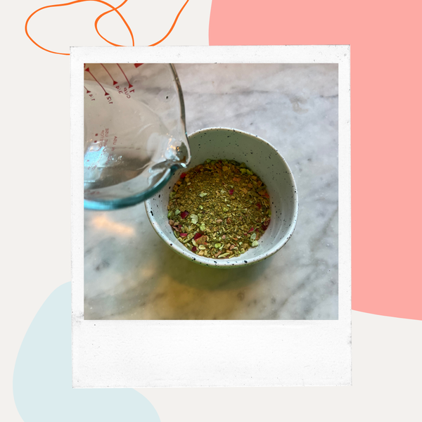 Water being poured into a bowl of Whole Food Mixer