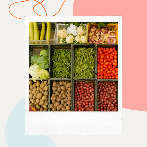 Crates of fresh vegetables at a market