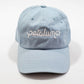 Light blue Petaluma dog-walking hat with embroidered logo, front view